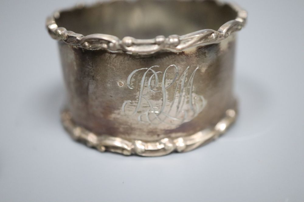 Six Hong Kong sterling dishes, with inset coin and three napkin rings.